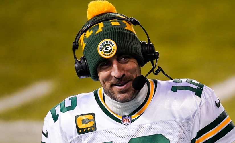 Aaron Rodgers confirms he was spotted riding in the back of pickup truck, flashing case of beer
