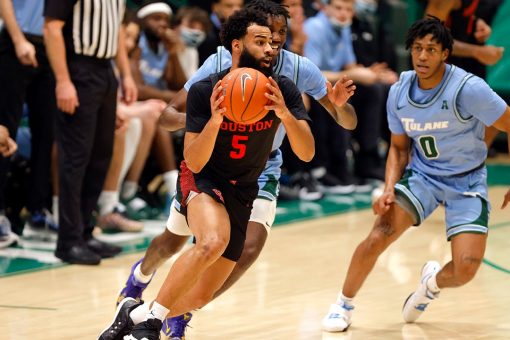 Tyson scores 31 points, No. 6 Houston routs Tulane, 83-60