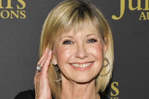 ‘Grease’ star Olivia Newton-John details first kiss with John Travolta: ‘It was a beautiful day’