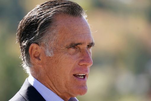 Romney sees footage for first time of him being directed to safety
