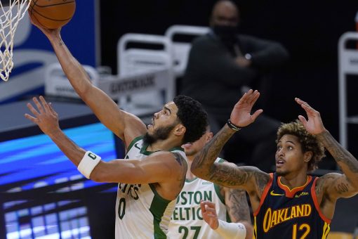 Tatum, Celtics hold off Curry and Warriors for 111-107 win