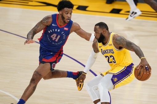 LeBron takes charge in 2nd OT, Lakers edge Pistons 135-129