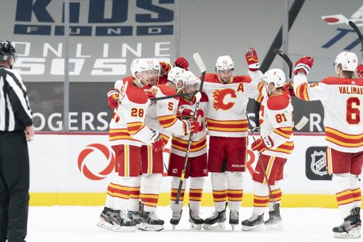 Gaudreau scores early in OT, Flames edge Canucks 4-3