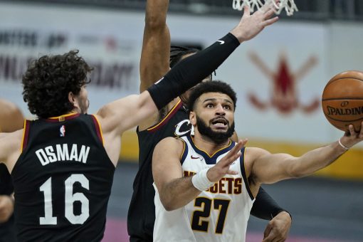 Murray scores historic 50 as Nuggets down crumbling Cavs