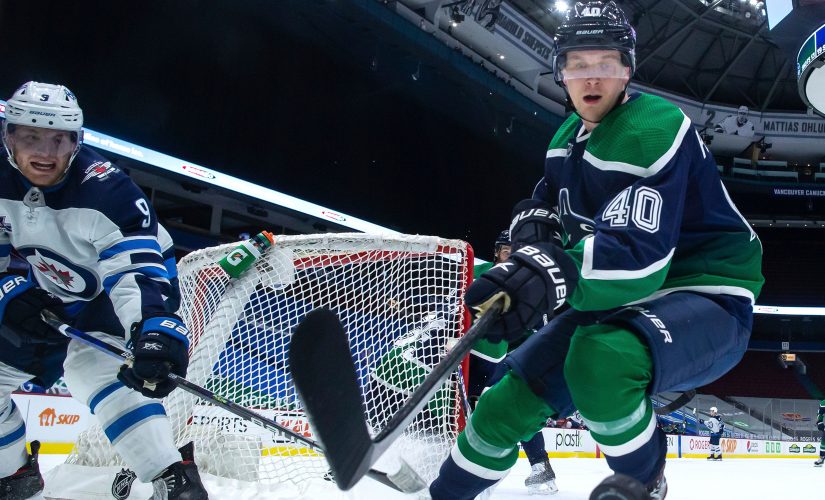 Laurent Brossoit makes 29 saves, Jets beat Canucks 2-0