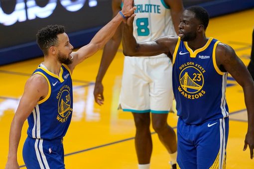Green notches triple-double, Warriors avenge loss to Hornets