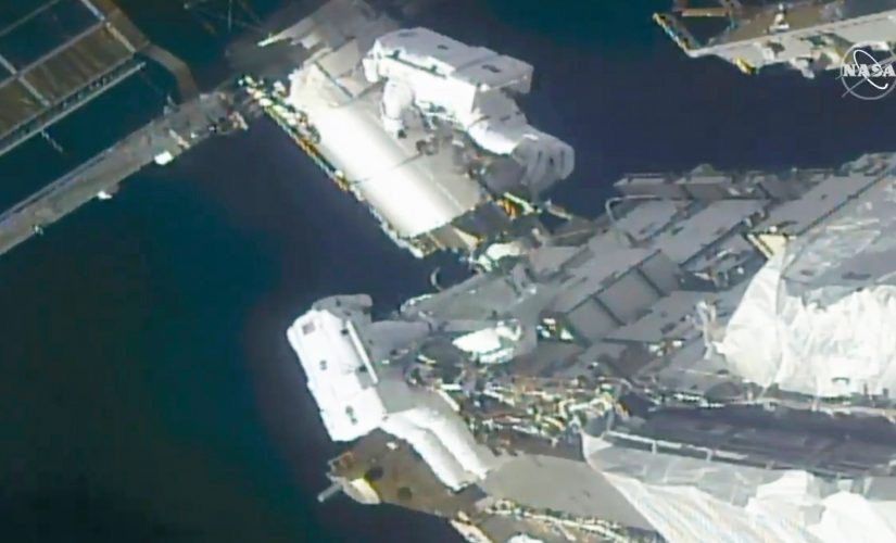 Spacewalking astronauts prep station for new solar wings