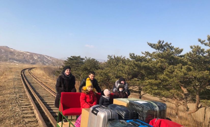 Russian diplomats exit North Korea by hand-pushed trolley