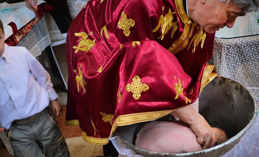 Romanian Orthodox Church faces backlash after baby dies following baptism