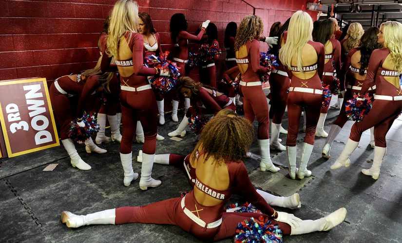 Ex-Washington cheerleaders settle claims with team: reports