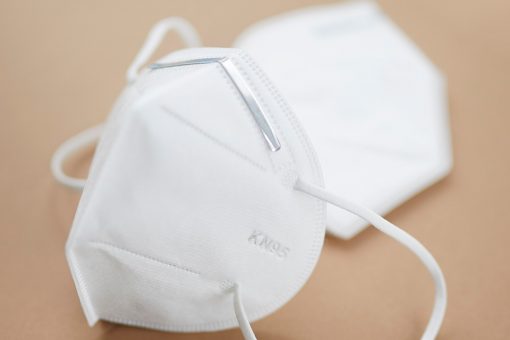 Hospitals still ration medical N95 masks as stockpiles swell