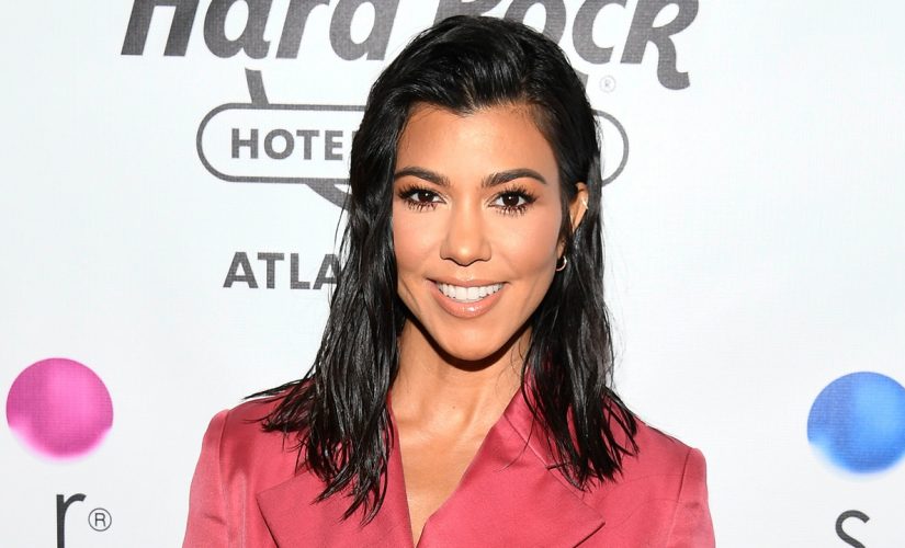 Kourtney Kardashian poses for sizzling swimsuit shoot