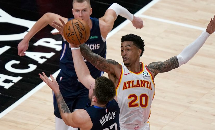 Doncic, Mavericks snap 6-game skid, hold off Hawks 122-116