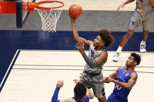McBride, Sherman help No. 17 West Virginia top No. 23 Kansas