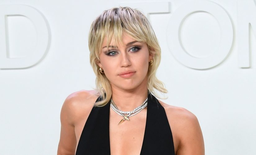 Miley Cyrus teases her barely-there costume ahead of pregame performance