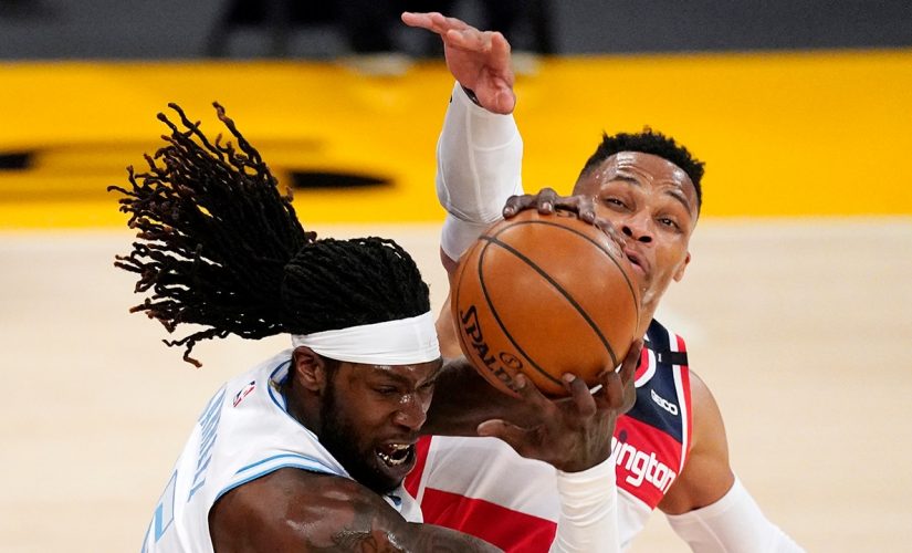 Wizards win 5th straight, hold off Lakers 127-124 in OT