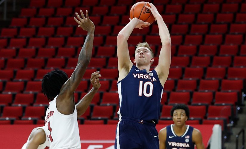 Hauser, Murphy lead No. 14 Virginia past NC State, 64-57