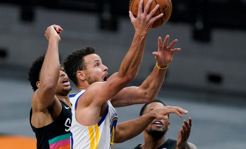 Curry leads Warriors to 114-91 victory, ending Spurs’ streak