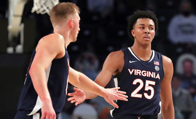 Murphy, Clark lead No. 9 Virginia past Georgia Tech 57-49