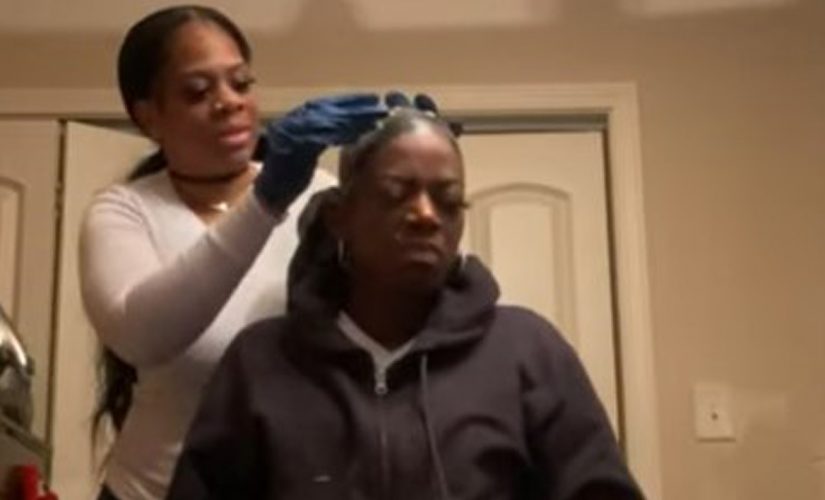 ‘Gorilla Glue girl’ Tessica Brown returns home, wears sweatshirt with own face on it