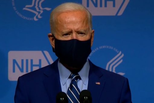 Biden indicates that masks will be worn though next year