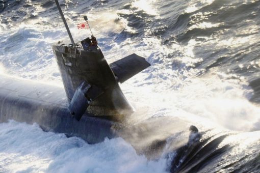 Japan submarine collides with commercial ship while surfacing: report