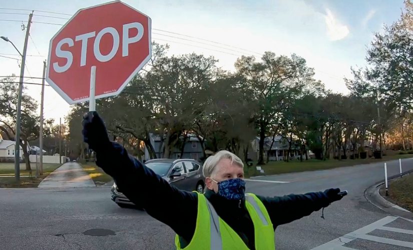 Florida crossing guard hailed a hero after saving 7-year-old from getting struck by car