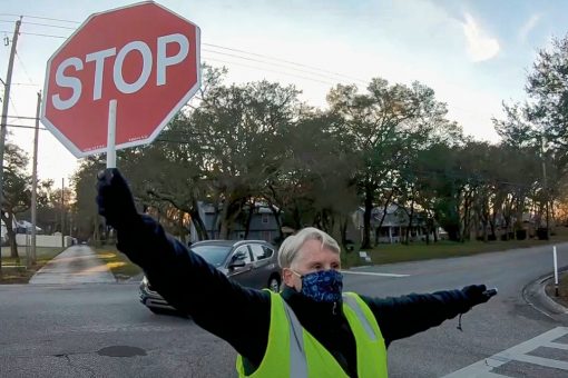 Florida crossing guard hailed a hero after saving 7-year-old from getting struck by car