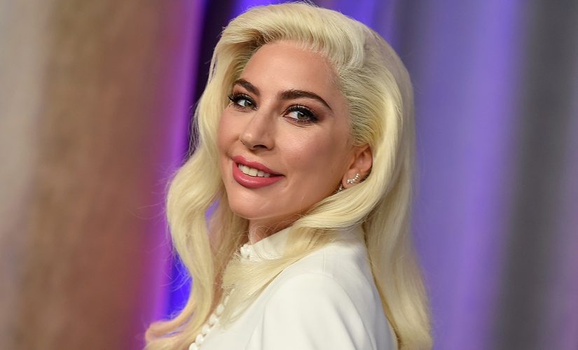 Lady Gaga has been ‘communicating’ with dog walker as she remains in Italy following shooting, her dad says