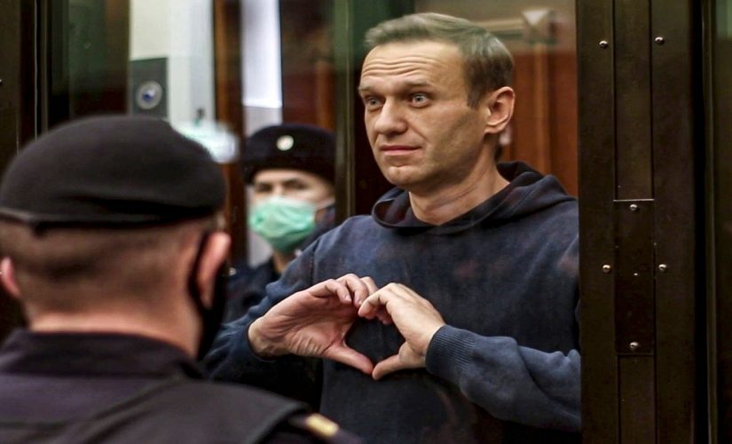 Russia blasts criticism of Putin critic Navalny’s prison term as 1,400 more protesters arrested