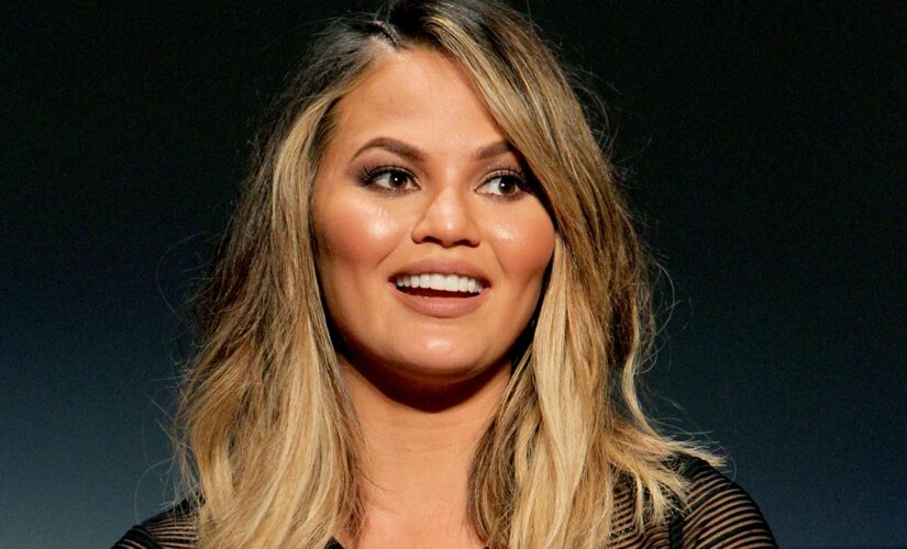 Chrissy Teigen responds to critics after topless pic interrupted by her son Miles catches backlash