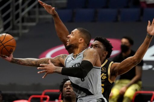 McCollum, Lillard lead Blazers past Raptors 122-117