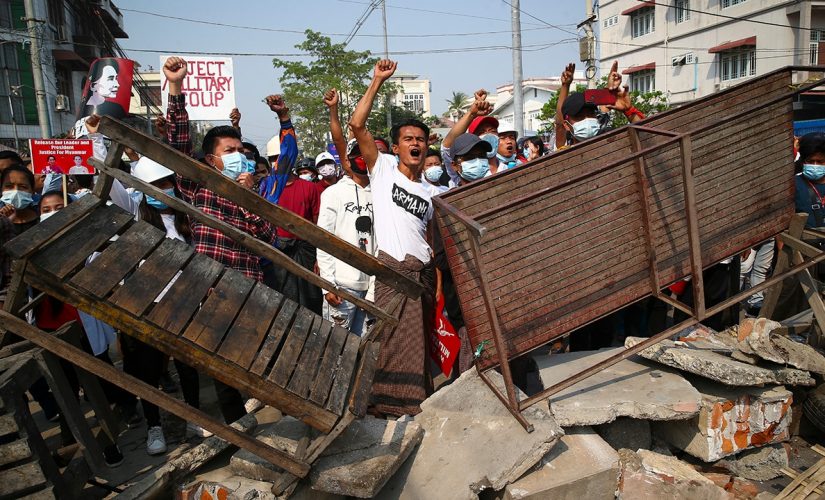 Burma descends into chaos after military coup, at least 18 protesters killed