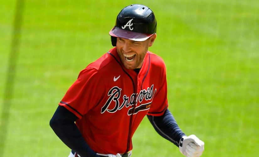 Braves’ Freeman celebrates his new baby ‘twins with a twist’