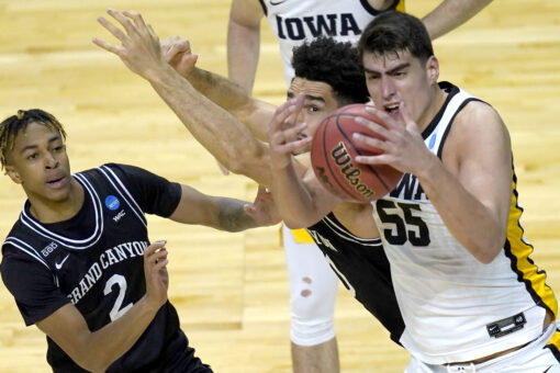 Sharp-shooting Iowa gets 24 from Garza to beat Grand Canyon
