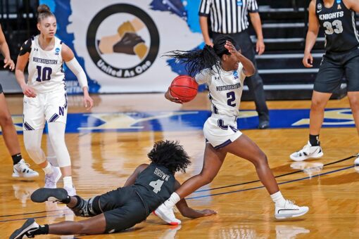 Northwestern women beat UCF 62-51, 1st tourney win since ’93