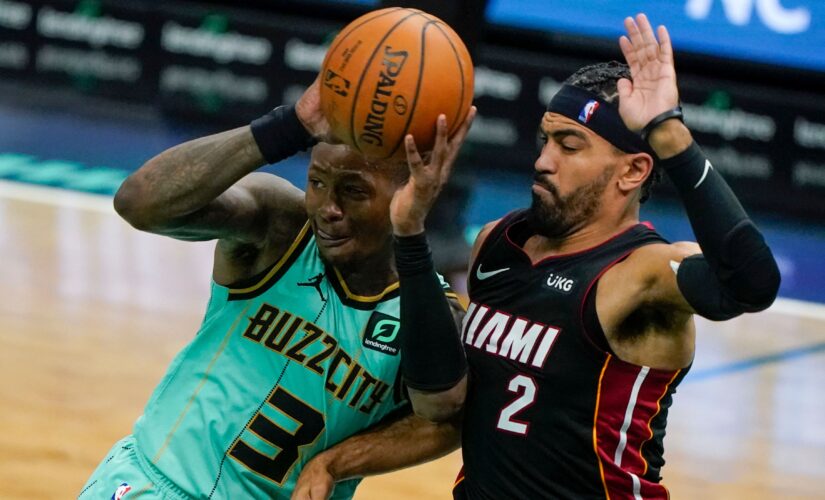 Monk scores 32 as Hornets hold on to beat Heat 110-105