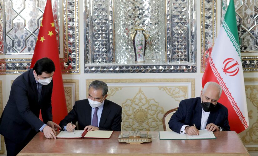 Iran, China sign deal to warn US against isolating them, professor says