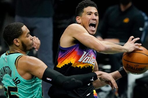 Booker’s 35 points leads Suns past Hornets 101-97 in OT