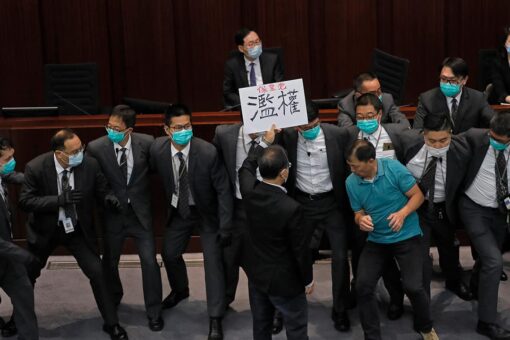 China reduces elected seats in Hong Kong legislature