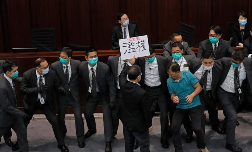 China reduces elected seats in Hong Kong legislature