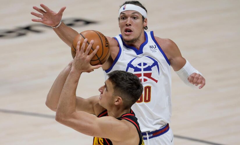 Gordon scores 13 in Denver debut, a 126-102 win over Hawks