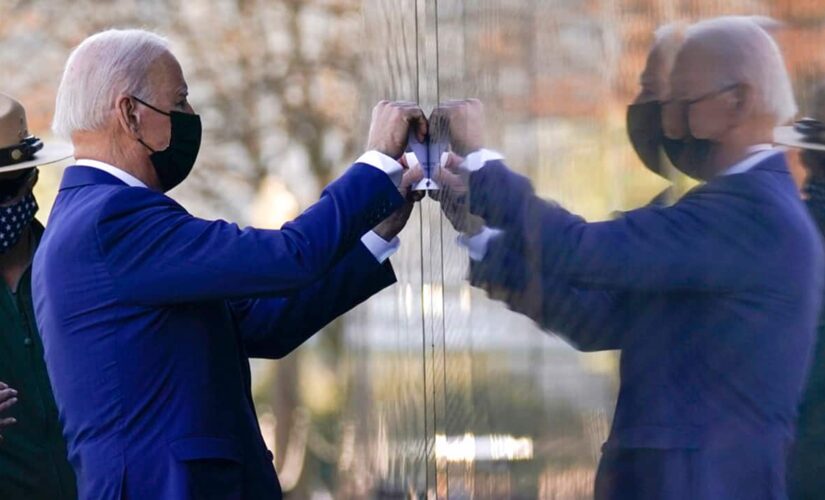 Biden marks National Vietnam War Veterans Day with impromptu visit to war memorial