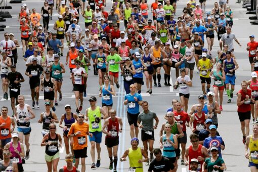 Boston Marathon’s plan to hand out 70K medals roils runners
