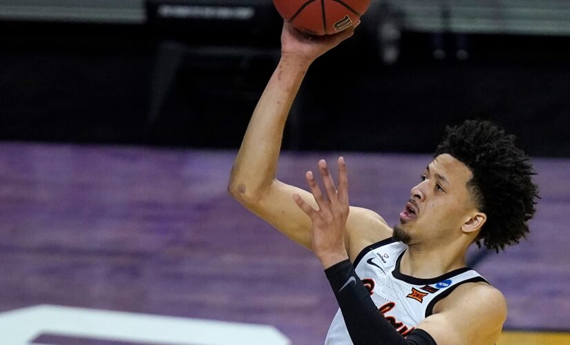 No. 4 Oklahoma State survives No. 13 Liberty 69-60 in NCAA