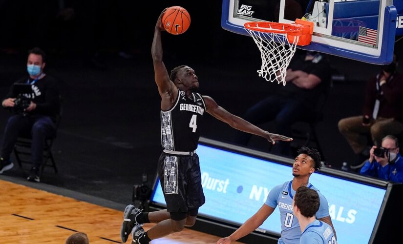 Ewing, Georgetown take Big East, NCAA bid with stunning rout