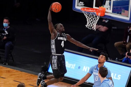 Ewing, Georgetown take Big East, NCAA bid with stunning rout