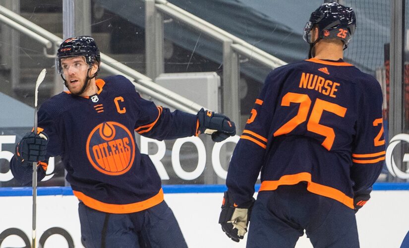 McDavid scores twice, Oilers beat Jets to tie for North lead