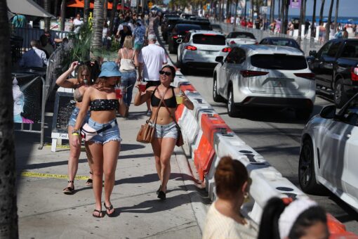 Health experts warn of new coronavirus spike as states ease restrictions, spring break travel surges