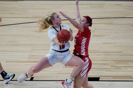 Louisville overcomes slow start to beat Marist 74-43